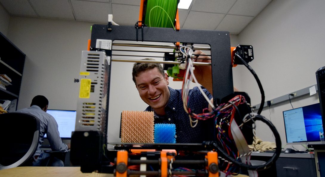 John Klein using 3D printer