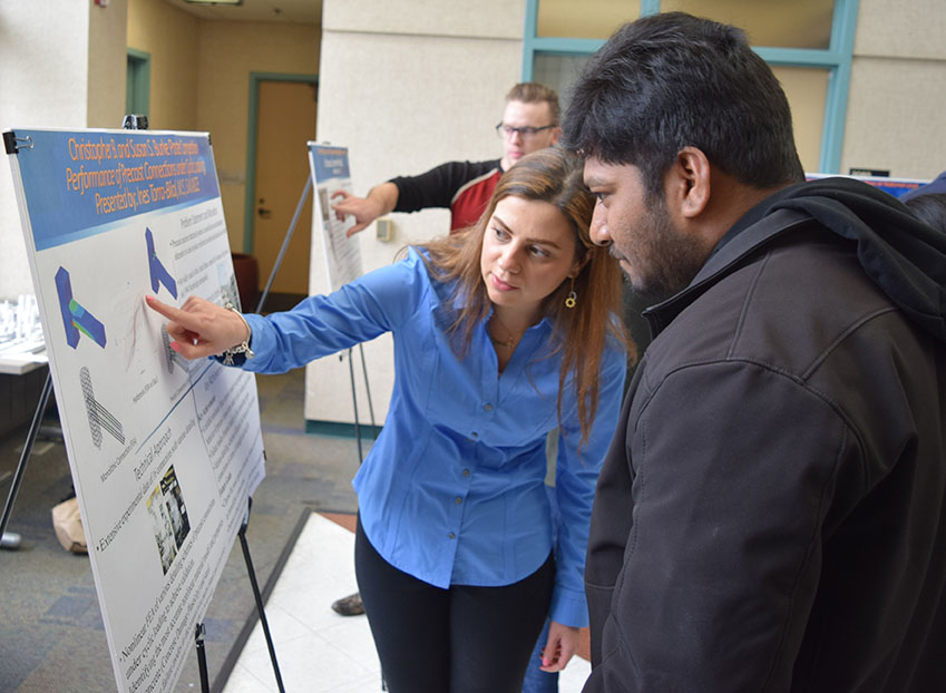 CME students observe posters