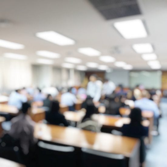 college classroom populated with students